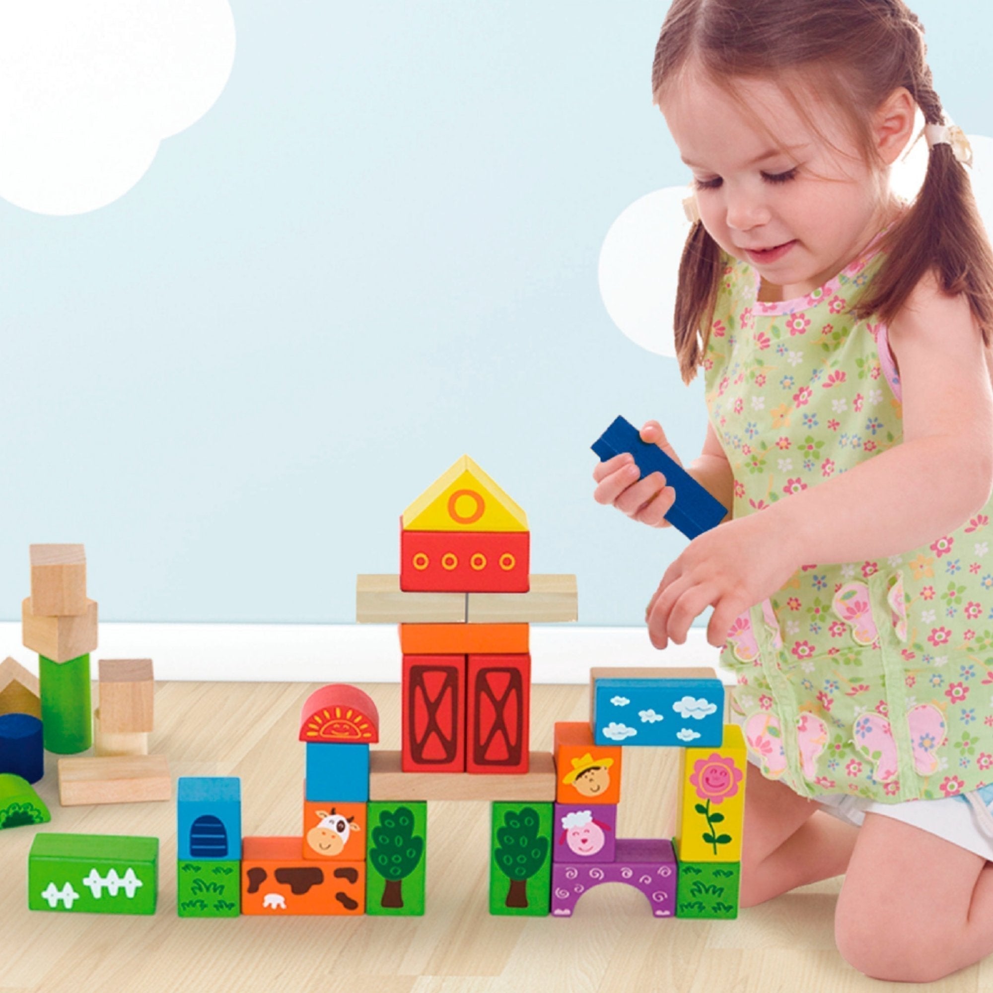 50 Piece Building Blocks Farm Set, What will your little one build first? With these wooden farm bricks children will love playing with these blocks so they can help build social skills working together to build and problem solve along with communication and language. Using the farm blocks your little one will be able to build and role play until their hearts content. When reaching for these brightly coloured bricks and placing them on top of each other this is developing their hand-eye co-ordination and fi