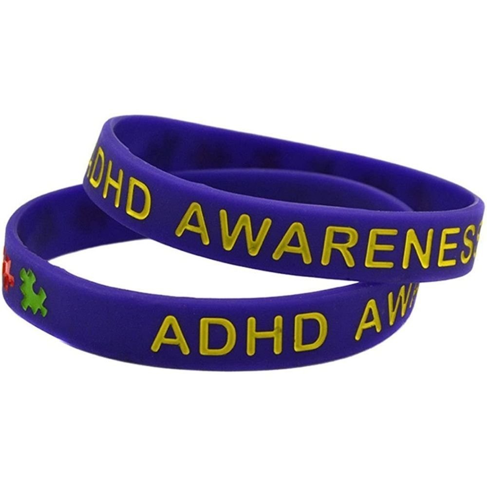 ADHD Awareness Bracelet, The ADHD Awareness Stretchy Silicone Gel Bracelet is more than just a stylish accessory. This bracelet not only spreads awareness of Attention Deficit Hyperactivity Disorder (ADHD) but also serves as a symbol of support for children and adults alike who are affected by this condition.Featuring a vibrant yellow band, the bracelet proudly displays the words "ADHD Awareness" to spark conversations and educate others about the challenges faced by individuals with ADHD. Surrounding the t