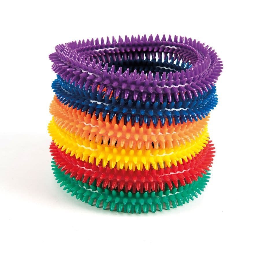 Aku Textured Ring, The Aku Ring is a soft and flexible ring and is designed with textured bumps, which transmit a pleasant sensory impulse. The Aku Ring is both easy to hold and flexible, these Aku rings provide tactile stimulation to the child. You can throw the Aku Ring, massage them all over your body or throw them to the bottom of the water and encourage the child to pick them up. The peculiarity of this Aku Ring tool makes it suitable for various applications. Flexible and textured, it is used in sever