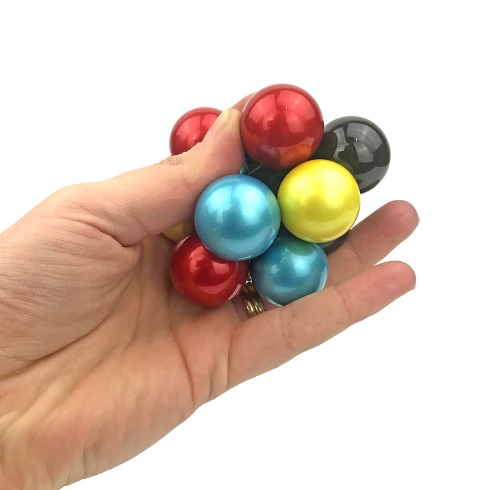 Atomic Fidget Ball Metallic, Twist, squeeze and fidget this puzzling Atomic Fidget Ball. Made up of a selection of elasticated squeezy balls that can be moved around in groups of two, this wacky fidget toy is superfun to play with! Ideal for use as a sensory toy to enhance mental focus, or simply as a stress reliever during long car journeys, the Atomic Fidget Ball is a useful and addictive sensory toy that kids won't want to put down. Whether you fidget with it or solve one of the puzzles, Icosa will keep 