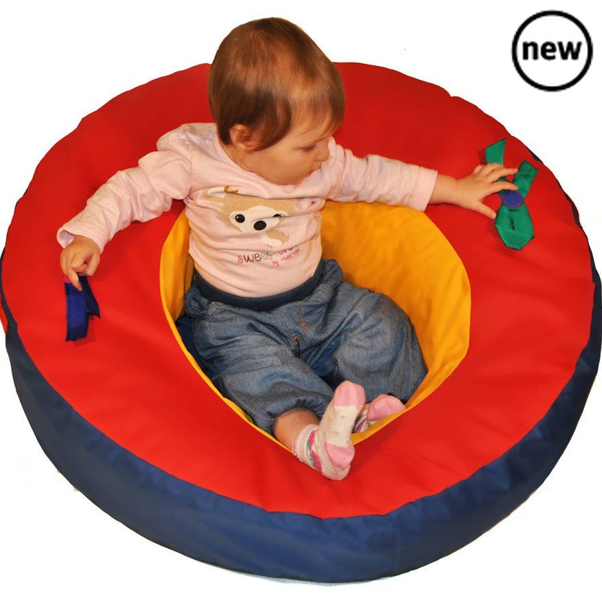 Baby Care Support Ring, The Baby Care Support Ring is designed to help during the vital first months of a baby's development. It gently supports their body, neck and head allowing them to look around and interact with the world at the earliest stage. The bright fabric provides visual stimulation and there are two attachment points for favourite toys. The Baby Care Support Ring is filled with soft fibre and has a foam cushion base providing a soft warm and comfortable nest. It is an important part of any pro