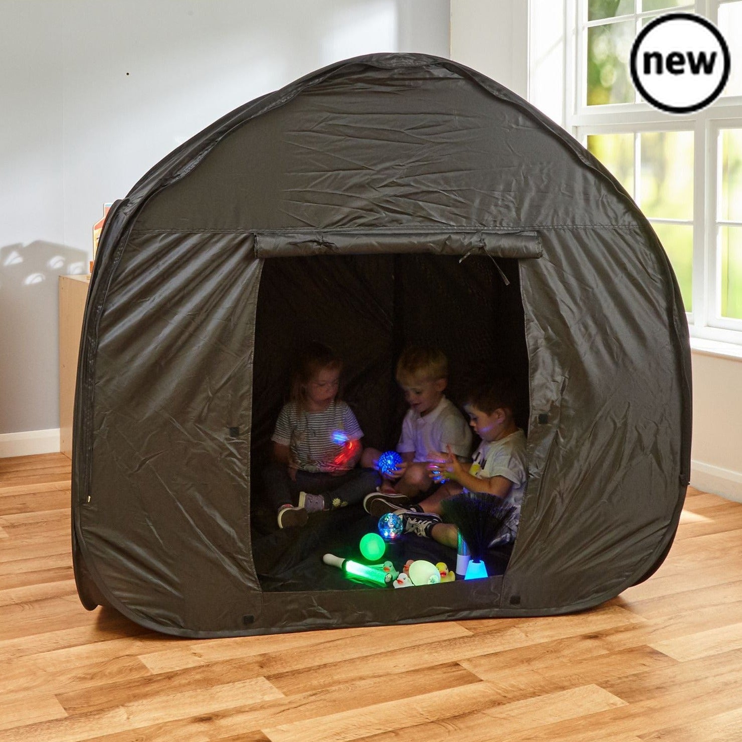 Black Dark Den, This fantastic pop-up sensory dark den pod is ideal for environments where a full sensory room is not available. Suitable for multiple users, the Dark Den Pod creates a temporary sensory room, with flaps which can tie up to create an open doorway into the area. Ideal for use with projectors and light sources, the double layered black environment creates a safe and enclosed area for sensory exploration. The Dark Den Pod is modular and can be easily joined with other Pods - perfect for creatin
