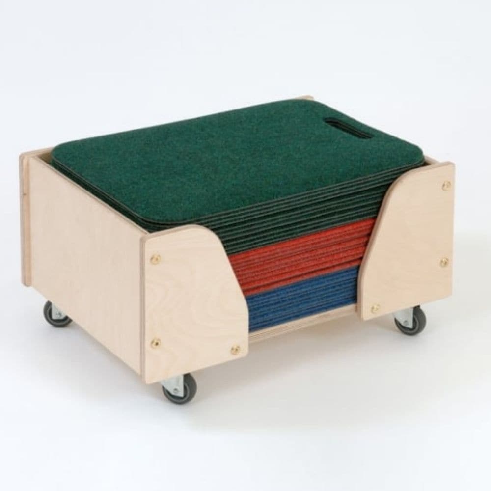 Bretton Mat Trolley, The Bretton Mat Trolley is a quality wooden trolley containing 30 indoor/outdoor children's seating mats. The Bretton Mat Trolley is constructed in the UK from exterior grade 15mm birch plywood. 4 heavy duty castors allow the Bretton Mat Trolley to be used outside as well as indoors. The Bretton Mat Trolley contains 30 seating mats made in the UK from Permafresh Carpets. Each seating mat measures 34 x 47cm and has its own integral carry handle. Ideal for outside seating. The mats are li