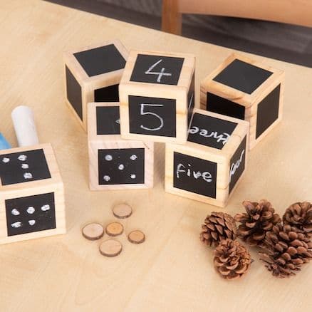 Chalk Wooden Cubes, This 6 piece Chalk Wooden Cubes set has a chalkboard surface each side of the cubes. Each Chalk Wooden Cube measures 7 x 7cm making it easy to grip and manipulate. Ideal for encouraging mark making or using for early number recognition. The possibilities are endless as each face can be used and reused! This 6 piece Chalk Wooden Cube set has a chalkboard surface each side of the cubes. Perfect size for early construction blocks Chalkboard face allows for multiple uses Made from FSC New Ze