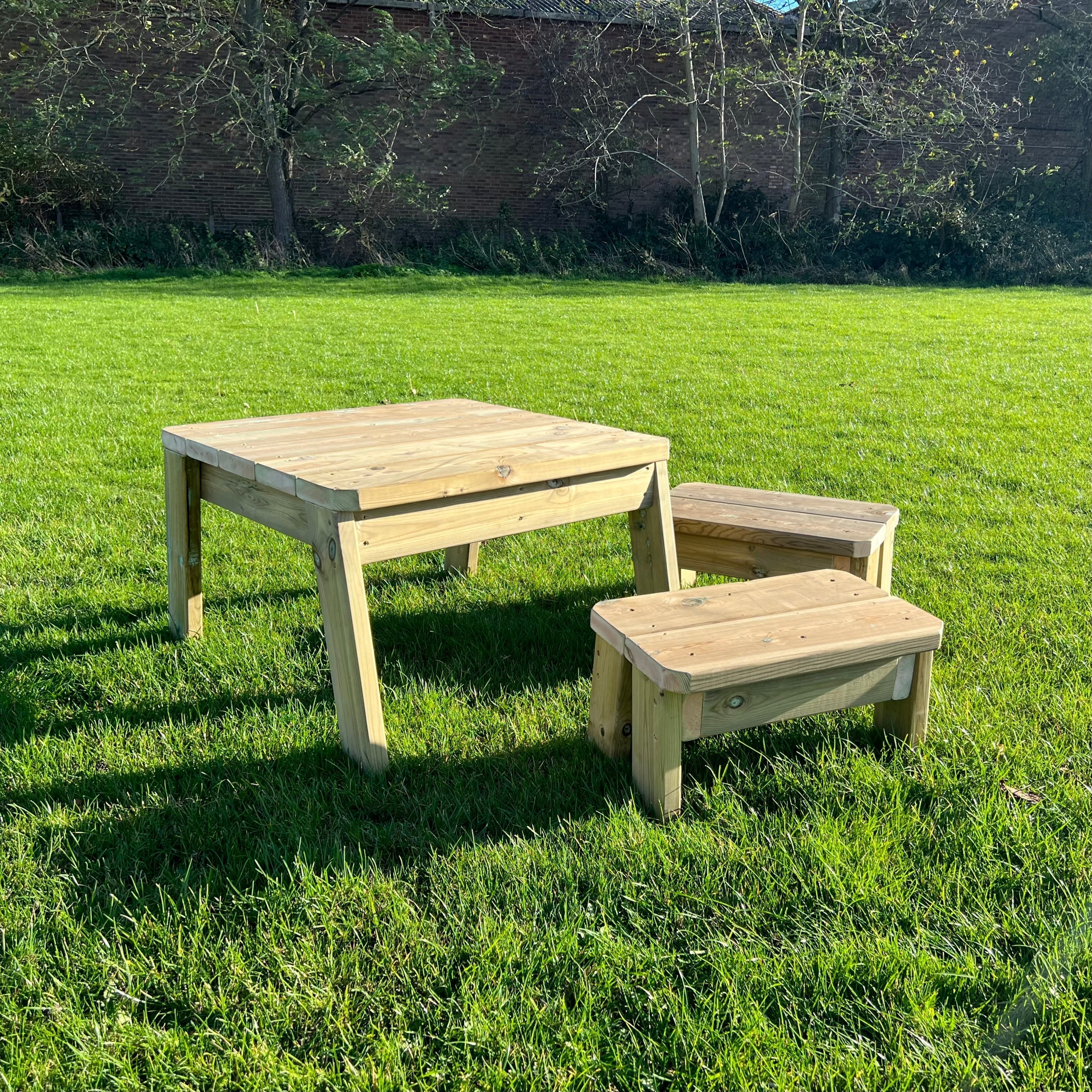 Children's Outdoor Mini Table and Benches, Every early years, educational environment needs outdoor seating! The Children's Outdoor Mini Table and Benches are suitable to accommodate at least 2 children at once. It is the perfect seating set to enjoy lunchtime outdoors.Robust and built in a square shape, this resource can be used in multiple outdoor lessons. The Children's Outdoor Mini Table and Benches is made from sustainable FSC Pressure Treated Redwood Timber. Delivery 4-6 weeks Delivered fully Assemble