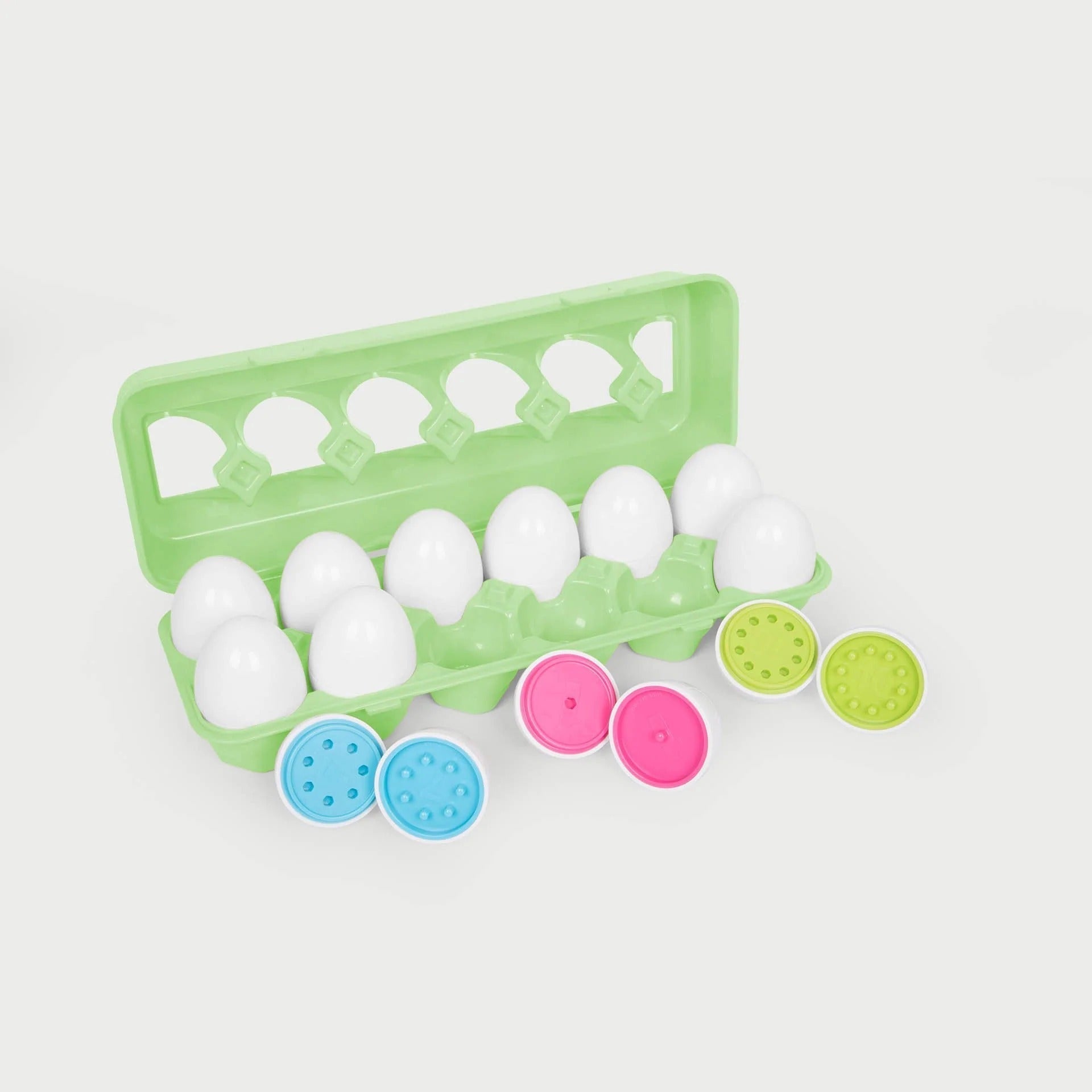 Colour Match Eggs, Unveil the Joy of Learning with TickiT Colour Match Eggs!Introduce your child to a world of numbers, colours, and fine motor skill development with TickiT's Colour Match Eggs set. This educational toy is thoughtfully designed to foster independent learning while offering a variety of ways to play and learn. Colour Match Eggs Features: Egg-citing Learning Open each egg to reveal brightly coloured numbers that correspond with matching pegs and holes. It's an ideal way to teach counting, num