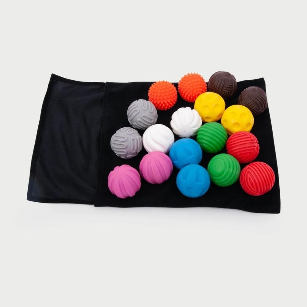 Discovery Ball Activity Set Pack 18, The Discovery Ball Activity Set is a versatile sensory ball set that contains 9 pairs of differently tactile colourful balls in a black feely bag. The Discovery Ball Activity Set will encourage sensory exploration, is ideal for child-led learning activities and can be used in a variety of ways: learning colour names; counting in twos; describing textures visually or by touch; sorting and matching the pairs by colour; counting and sorting the different patterns; simple ma