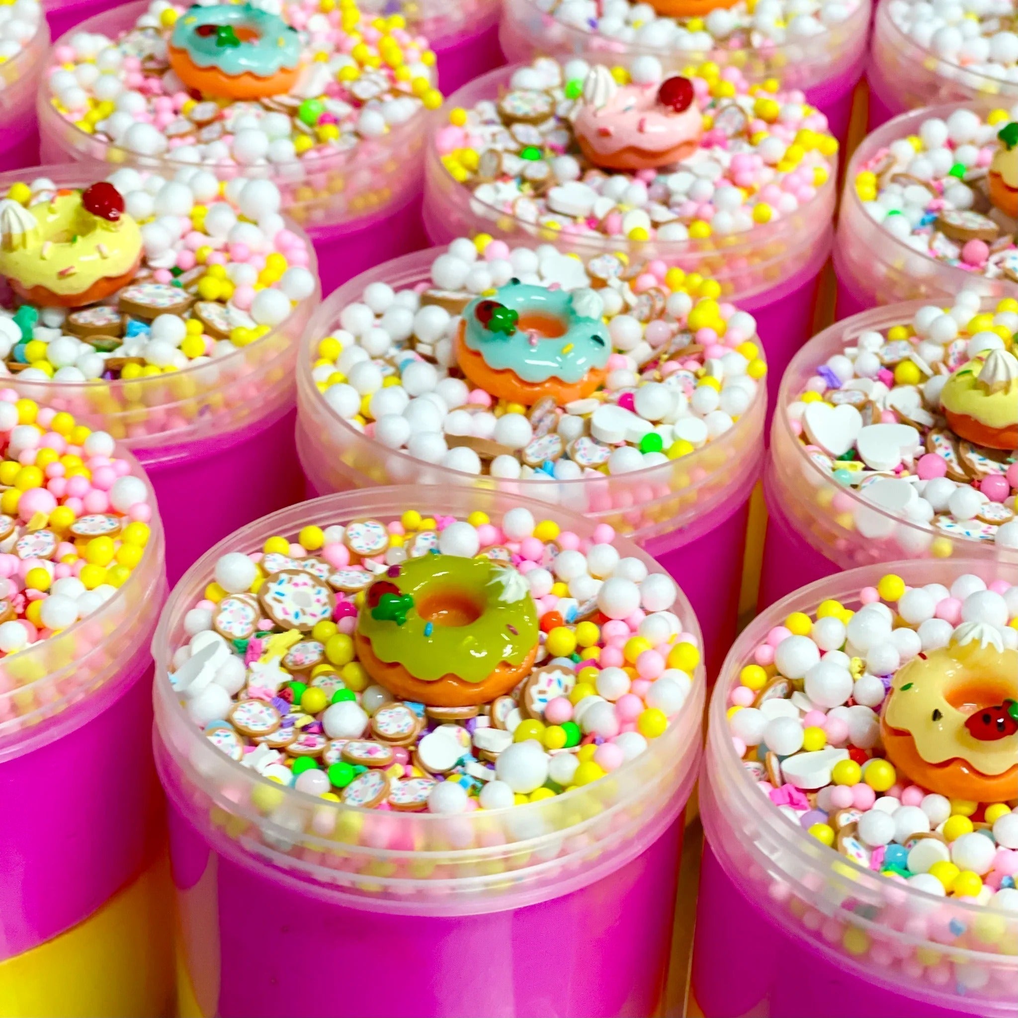 Donut Dash Putty, Our Donut Dash putty is like a birthday party in a jar! The duo of pink and yellow putty perfectly compliment the pink, yellow and white floam beads, adorable donut sprinkles and our marvelous donut charm on top! Putties are air reactive and will dry out of left out. Always return to the container after play with the lid tightly on. Keep away from direct sunlight. Keep away from fabrics and porous surfaces. Container Size: 275ml Ages 5+, Adult supervision recommended. Donut Dash Putty Wash