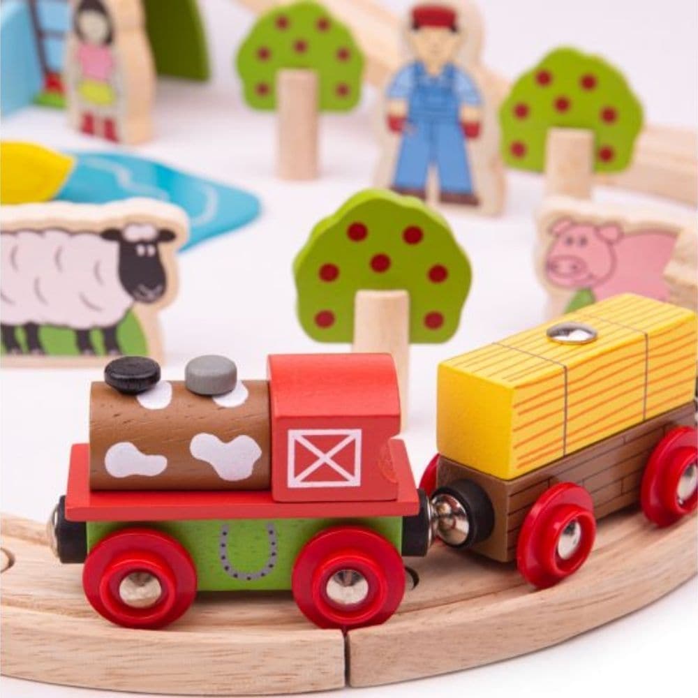 Farm Train Set, Story-telling and creative play is never ending with this Farm Train Set. Youngsters can drive the farm train through the apple orchards and help the farmer deliver hay bales before stopping for a rest by the duck pond. Additional accessories are available to expand this set. Most other major wooden railway brands are compatible with Bigjigs Rail. Made from high quality, responsibly sourced materials. Conforms to current European safety standards. Consists of 45 play pieces. Story-telling an