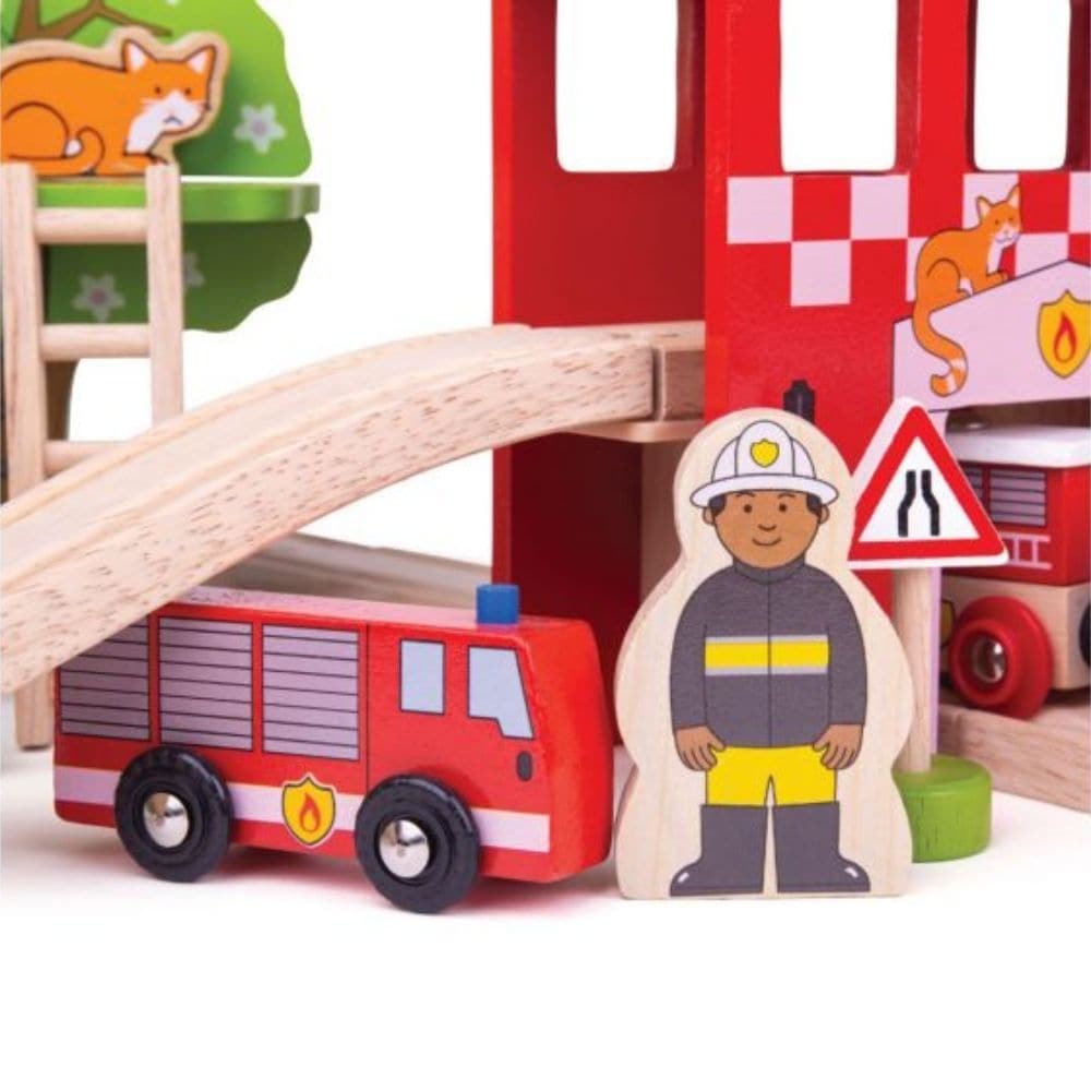 Fire Station Train Set, Race to the rescue with the Fire and Rescue Train Set! Whether your little one is fighting fire or rescuing the cat stuck in the tree, they can race to the emergency using the fire rescue train and carriages with removable loads. Speed through the fire station tunnel, past the road signs and straight to the emergency where two firefighters are available to climb the ladder or use the fire hydrant to fight the fire! This wooden train set encourages imagination, dexterity and coordinat