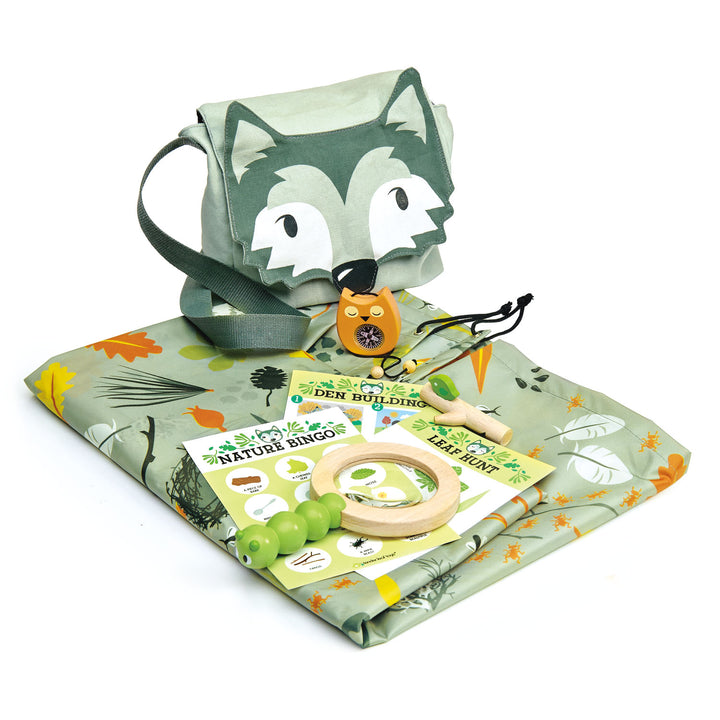 Forest Trail Kit, Embark on an adventure into the enchanting woods with the Forest Trail Kit. If you go down to the woods today, make sure to bring along this fantastic set that includes a wild wolf bag, a nature trail whistle, and a super waterproof groundsheet.The heart of this kit is the large, illustrated groundsheet measuring an enormous 142cm x 142cm. Decorated with forest floor treasures, it provides the perfect setting for outdoor exploration and imaginative play. From picnics to picnics to storytel