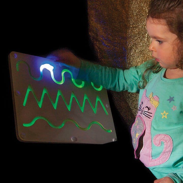 Glo Board Hills Valley & River, Follow the pattern with the UV pen - then watch it fade before your eyes. The reverse side of the Glo Board Hills Valley & River has a dry wipe surface for extra versatility. The Glo Board Hills Valley & River is ideal for sensory play - stimulating and gives instant feedback.The Glo Board Hills Valley & River helps create a calming mood.The Glo Board Hills Valley & River is made from a polymer based material containing glow crystals to create a truly unique magical effect. T