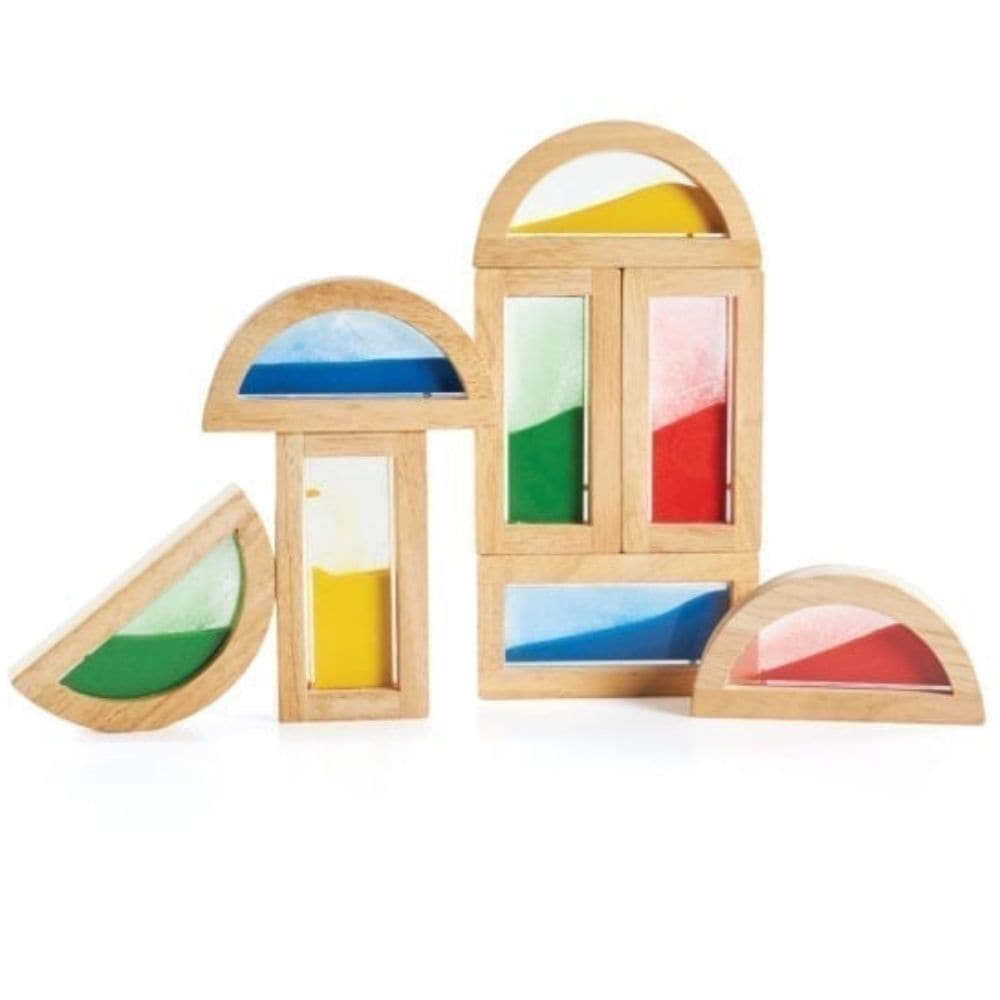 Guidecraft Rainbow Blocks Sand, Use the Guidecraft Rainbow Blocks Sand to enhance traditional block play with this set of 8 Rainbow Blocks in various shapes filled with colorful sand. An adventure in color, light and sound! Indulge your child’s appetite for exploration by combining blocks to form new colors and sounds, or stack the blocks in a different order each time to form new and exciting shapes. Smooth hardwood frames with primary colored acrylic windows.The Guidecraft Rainbow Blocks Sand has eight bl