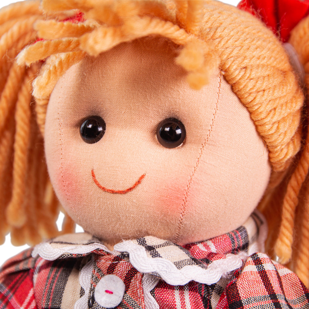 Mandie Doll - Medium, Introducing Mandie, the lovable and huggable doll who is guaranteed to brighten up anyone's day. With a smile as radiant as her heart, she is ready to become your little one's best friend for life.Mandie is not only adorable but also stylishly dressed in a vibrant and colorful outfit. The eye-catching ensemble is embellished with delicate floral detailing, adding a touch of sweetness to her already captivating presence.Crafted from premium-quality materials, Mandie is incredibly soft t