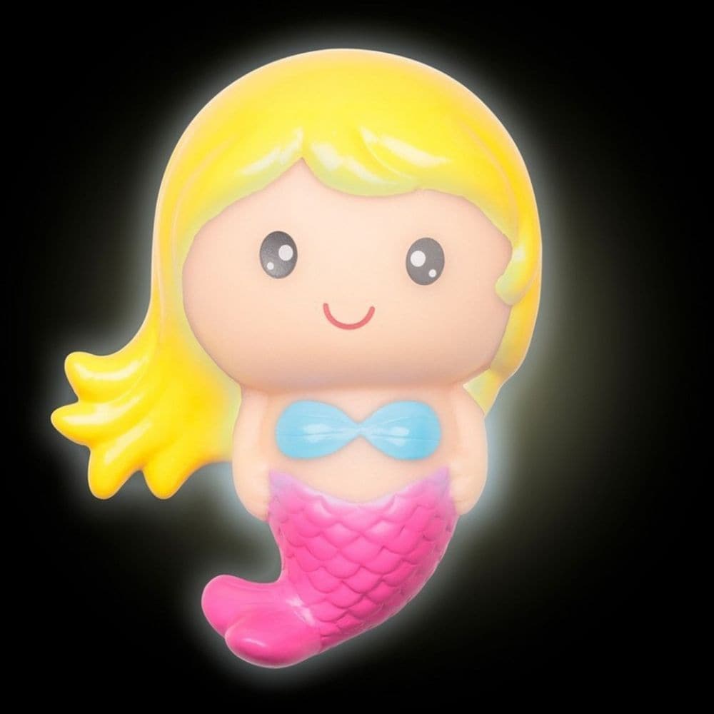 Mermaid Bath Light, Make bath time magical with a happy little mermaid bath toy that lights up when she touches the water! A sweet little bath toy that will entice even the most reluctant of bathers, this cute mermaid floats on the water flashing with colour change light. When bath time's over, simply dry off the back and she'll switch off again. Available with blonde hair or with red hair, designs will be chosen randomly. Light up mermaid bath toy Colour change LED Touch sensitive; touch sensors on back of