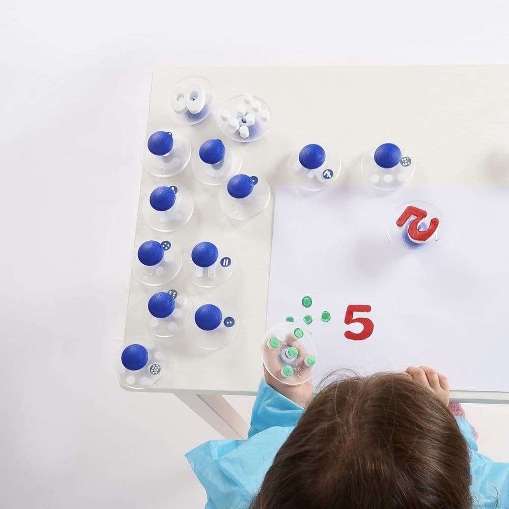 Number Stampers - Pk26, The sturdy number and dot stampers set offers a comprehensive, hands-on learning experience for young children aged 3 and up. One of the primary benefits of this Number Stampers set is its focus on number recognition and correct number formation. By physically stamping numbers and dots, children can solidify their understanding of numerical concepts while also practising their fine motor skills. This tactile approach makes learning more interactive and memorable, especially for young