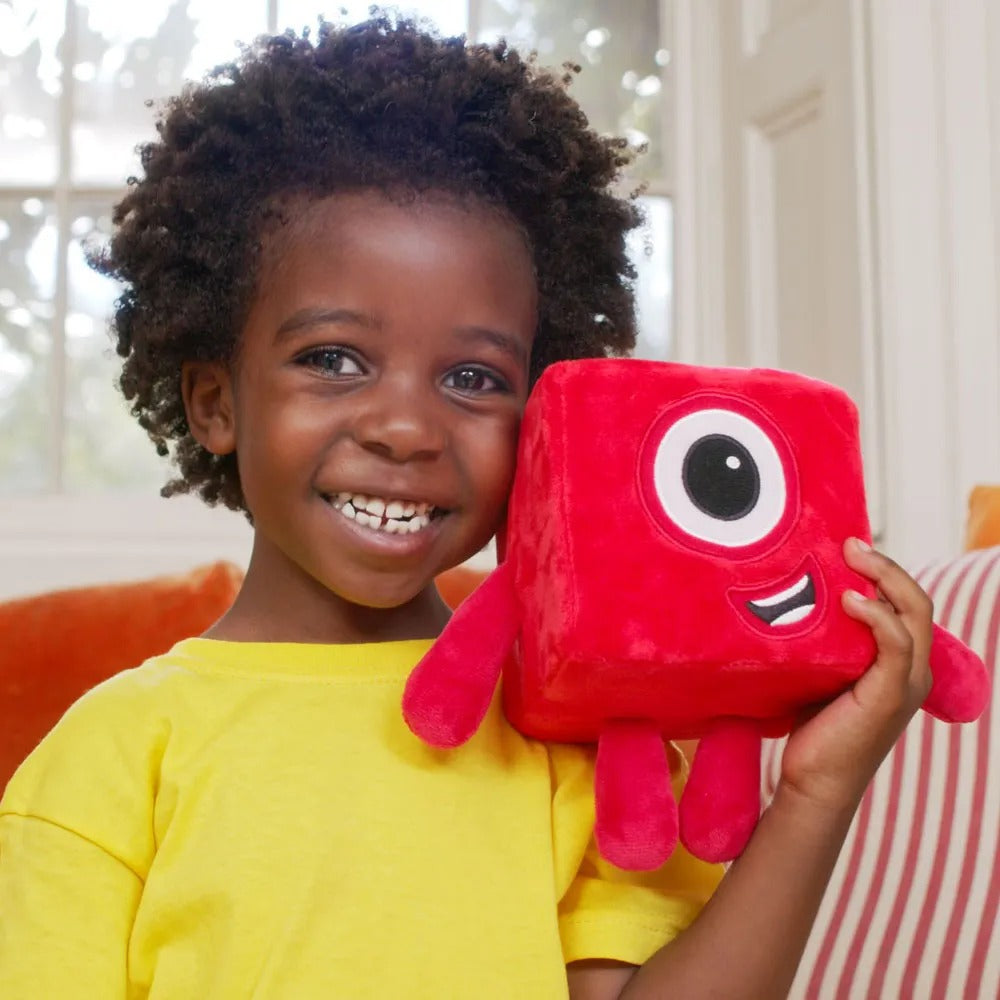 Numberblock One, Bring the on-screen magic of the Numberblocks to life for young fans of the award-winning CBeebies TV series with this Numberblocks One plush toy. The Numberblock One is made from super-soft plush fabric and with embroidered features, it’s ready for cuddles and snuggles. This plush toy is stuffed with high quality foam to keep its shape, with securely attached limbs, and will be a fun, cuddly companion for years to come. This bright, fun soft Numberblocks toy will inspire young imaginations