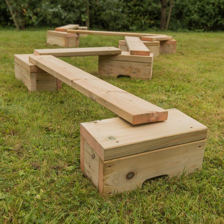 Outdoor Wooden Mini Adventure Trail 14pcs, Develop coordination and balancing skills with this wooden, outdoor balancing beam set. Create endless pathways and levels with this adaptable beam and block set. Change direction, length and height for multiple configurations. Use blocks and planks as loose parts play resources. This set is ideal for pack-away settings or smaller spaces, as it is lightweight and trails can be built in a variety of ways. Or why not create a balance trail around the edge of your out