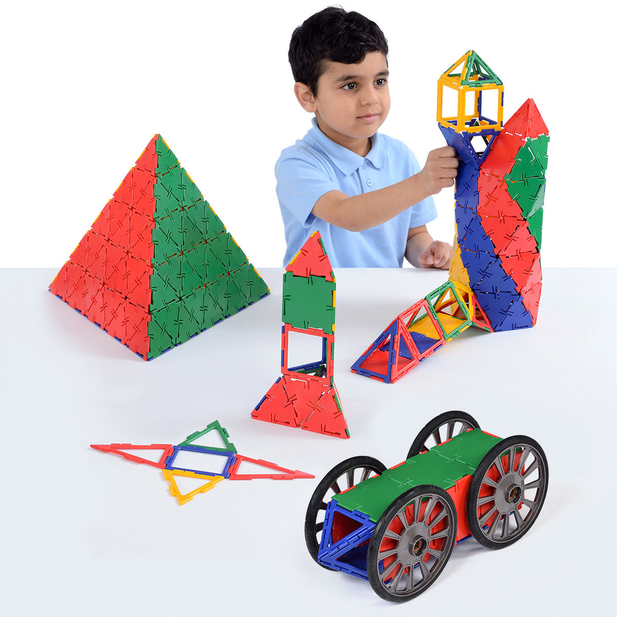 Polydron Mighty Box, The Polydron Mighty Box is a highly versatile construction system used in schools worldwide. With this set, children can explore and build a wide variety of 2D and 3D models, allowing their creativity and problem-solving skills to flourish.One of the standout features of the Polydron Mighty Box is the inclusion of wheels, which enable the construction of moving vehicles. This feature adds an exciting element to the building process, allowing children to create functional models that can