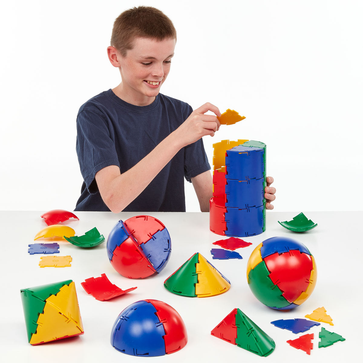 Polydron Sphera Class Set, Introduce your classroom to the fascinating world of spherical models with the Polydron Sphera Class Set. This comprehensive set is designed to engage and inspire students as they build and explore over 16 different spherical models together.Containing a total of 196 pieces, this class set provides ample resources for large groups of children to work collaboratively. The set includes 36 sphere pieces, 72 quadrant pieces, 16 cone pieces, 12 cylinder pieces, 20 squares, and 40 right