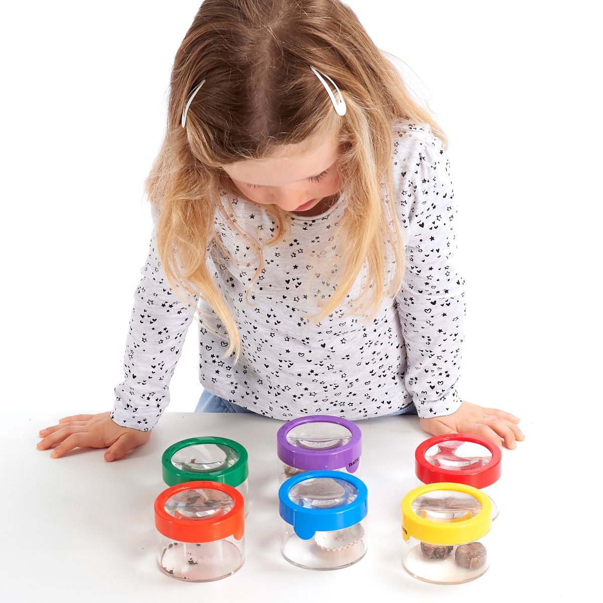 Rainbow Viewers Pack of 6, The Rainbow Viewers are a set of observation pots with a magnifier in the brightly coloured push on lids.The Rainbow Viewers are ideal for investigating natural resources up close. The Rainbow Viewers make it easy to view insects without harming and handling them. Can be used when children are investigating invertebrates up close in order to classify them into commonly found groups such as insects, spiders, snails and worms. In six different colours, each child can easily identify