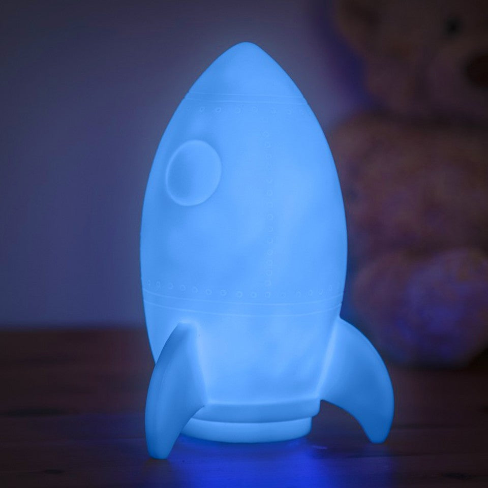 Rocket Night Light, Illuminate your child's nights with this delightful Rocket Night Light. Equipped with a colour change LED, this light gently shifts from one colour to the next, creating a calming and mesmerizing light show, suitable for any child's room. Features of the Rocket Night Light: Design: Shaped like a sweet rocket, appealing to children’s imagination. Lighting: Lit by a colour change LED that scrolls through various colours. Safety: Remains cool to the touch, ensuring it’s safe for even the sm