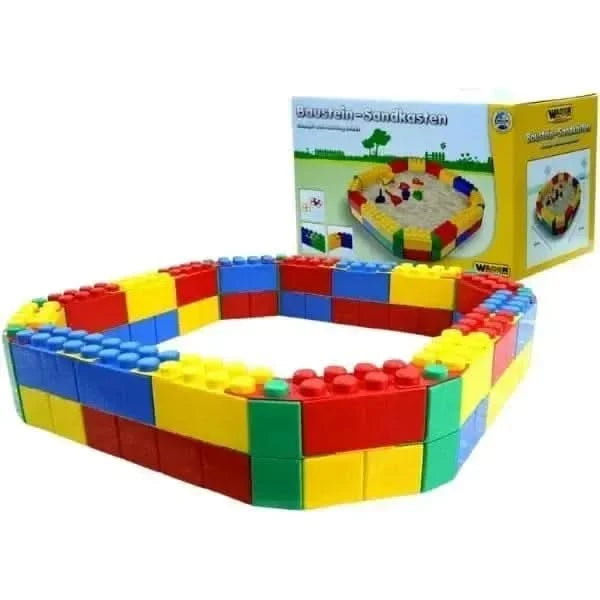 Sandpit with building bricks-Sandpit with building bricks