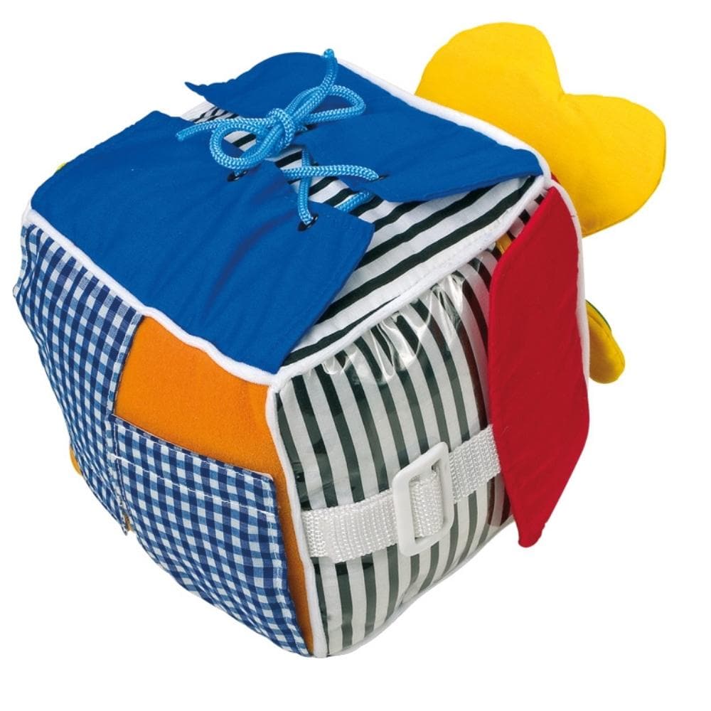 Skills Activity Cube, Boost your child's motor skills in a fun and interactive way with the Skills Activity Cube. This softly padded cube is not just a treat for the eyes but also a treasure trove of activities that can keep your child engaged for hours. Key Features: Soft and Safe: Made of high-quality, soft padded material that is safe for children. Multifaceted Learning: Each side of the cube offers a unique fastening mechanism to stimulate a range of motor skills. Variety of Fastenings: Features lacing,