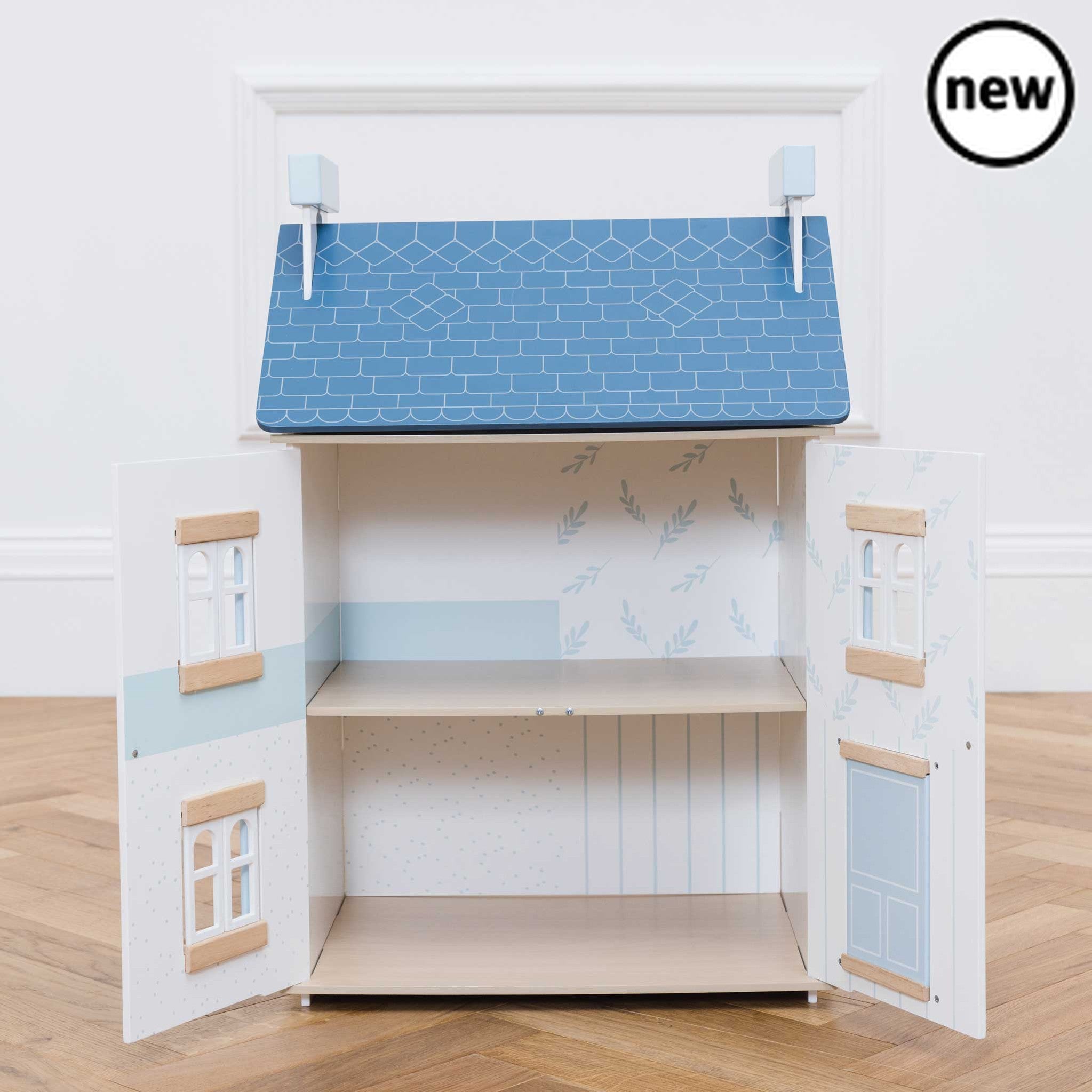 Sky House Dolls House, Description Sky House offers all the charm of a traditional wooden dolls house with an added modern luxe feel. We adore this beautiful toy, painted in muted whites with a natural wood finish and adorned with the prettiest pastel blue accents. This gem of a home is ideal for gender neutral play and makes a striking addition to the kids room. A cosy place for miniature friends to explore. This sweet home encourages creative role play and helps with those vital co-ordination skills, for 
