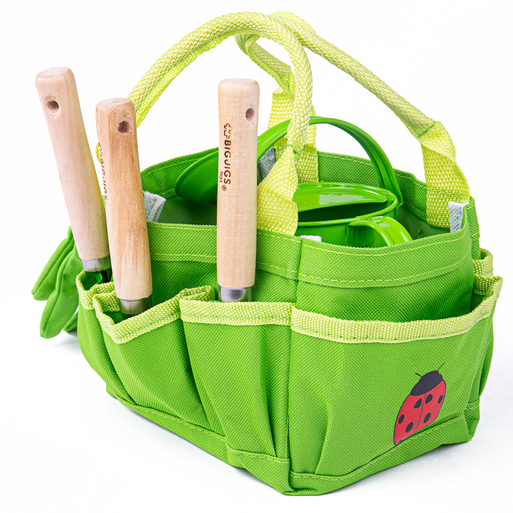 Small Tote Bag with Tools, The Bigjigs Toys Small Tote Bag with Children’s Garden Tools has everything little gardeners need, including a watering can with a fixed spout, elasticated gardening gloves, a hand spade, trowel and rake. The tote bag even has a pretty red ladybird accent. Our children’s gardening set is the perfect place to keep all the garden tools safe. They’re made for real work and are perfect for digging in the dirt next to Mum and Dad. The elasticated wrists on the gardening gloves ensure n
