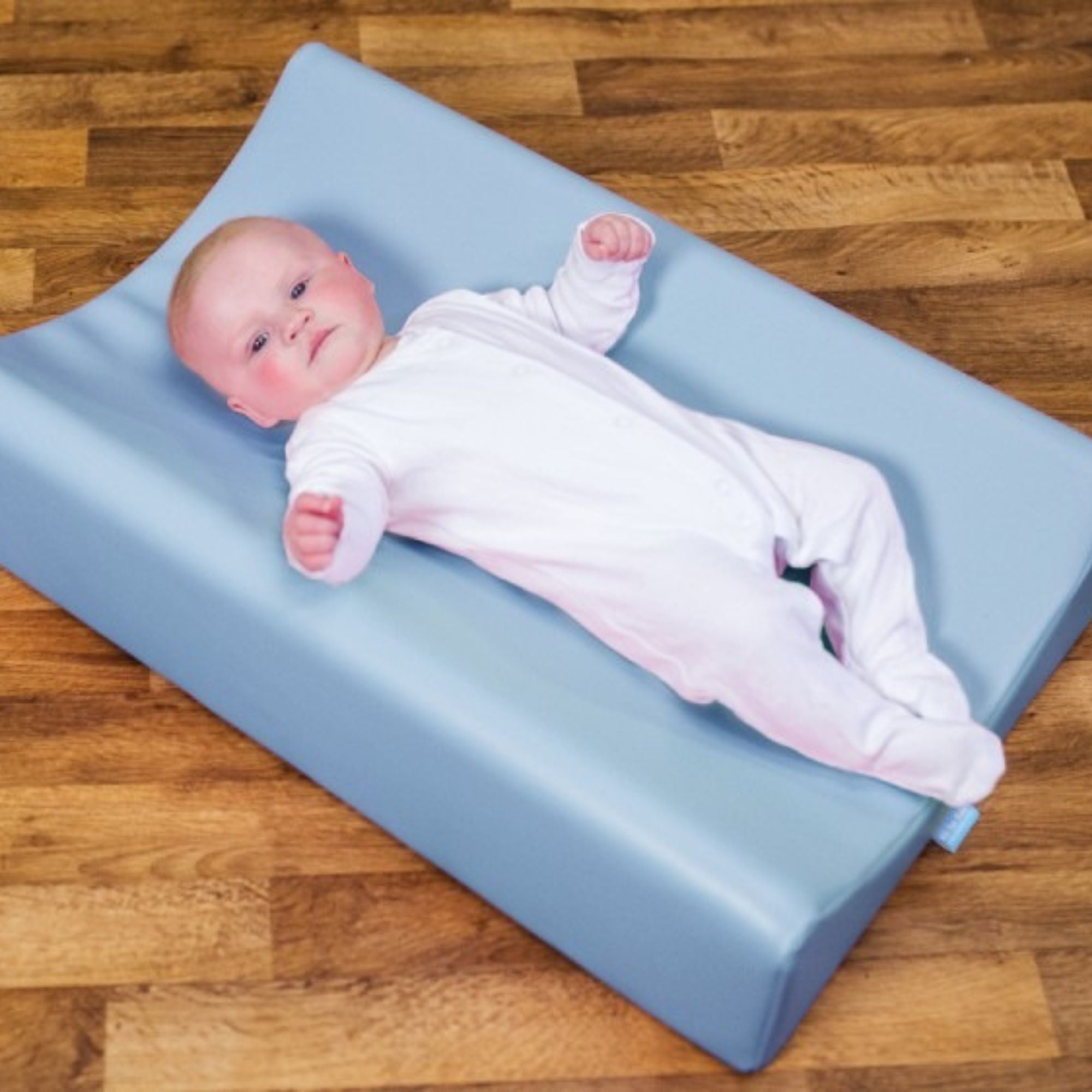 Snoozeland™ Changing Mat Light Blue Pack of 3, The Snoozeland™ Changing Mat Light Blue is our toughest professional changing mat for use on its own or on changing tables or units. The Snoozeland™ Changing Mat Light Blue has a deep profiled foam design forms a concave surface to gently hold active and larger babies without restricting access The Snoozeland™ Changing Mat has a Wipe-clean surface designed for constant cleaning The Snoozeland™ Changing Mat comes as a set of 3 changing mats. Our toughest profess