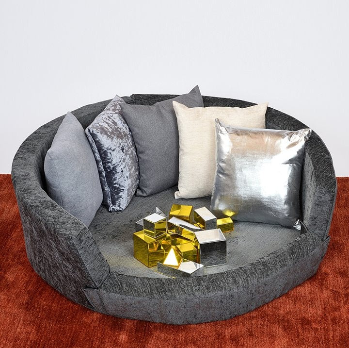 Snuggly Den Grey Chenille, The Snuggly Den Grey Chenille is our best selling Snuggly Den in a soft grey chenille fabric complete with a set of five grey tone cushions, which will give a chic and stylish feel to your room. Create an oasis of calm with our award winning Snuggly Den. Small enough to fit into most environments our Snuggly Den is designed with a low front to allow easy access. It’s great for giving children their own space. Fill it with balls or blankets. Zipped removeable covers with a waterpro