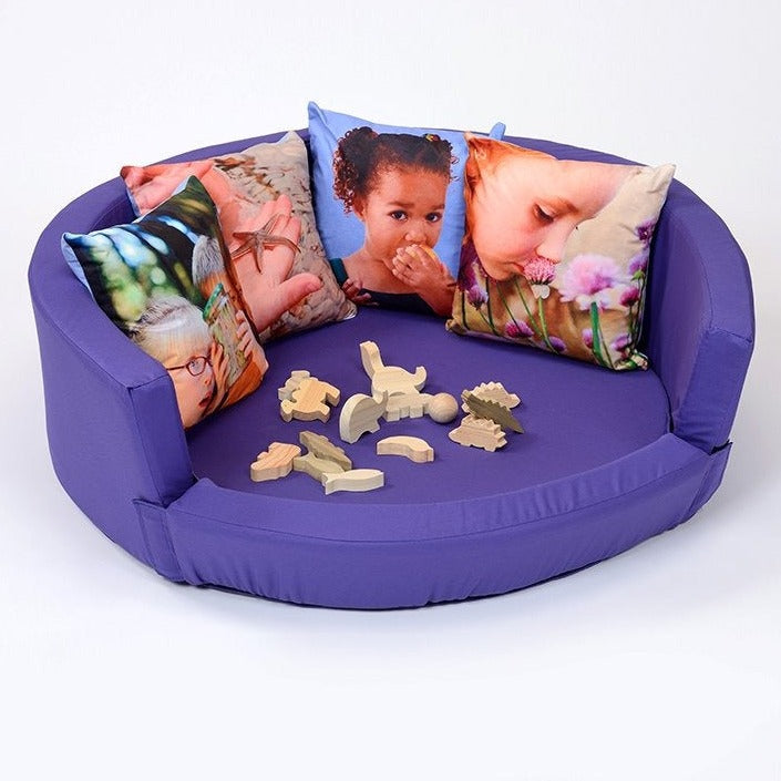 Snuggly Den Purple Cotton, The Snuggly Den Purple Cotton is designed with a low front to allow easy access, even this can be removed to make it accessible to even the tiniest customer. The Velcro strip on the base is the 'fluffy' Velcro so children will not scratch their legs when crawling into the Den. Fit it out with our range of accessories to instantly change its use, making this a most versatile addition to your setting. The Snuggly Den Purple Cotton is made from bright coloured cotton with a moisture 