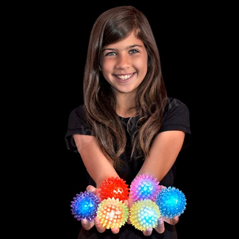 Spikey Light up ball, Experience the fusion of tactile delight and mesmerizing illumination with our Spikey Light Up Ball! Crafted for both sensory stimulation and fun, this ball is far from ordinary. Molded with soft, tactile spikes, the Spikey Light Up Ball offers a unique texture that's soothing to touch and handle. The gentle, flexible spikes not only make the ball easy to grasp, catch, or throw, but they also offer a therapeutic massage experience as the ball rolls across the hands, offering sensory re
