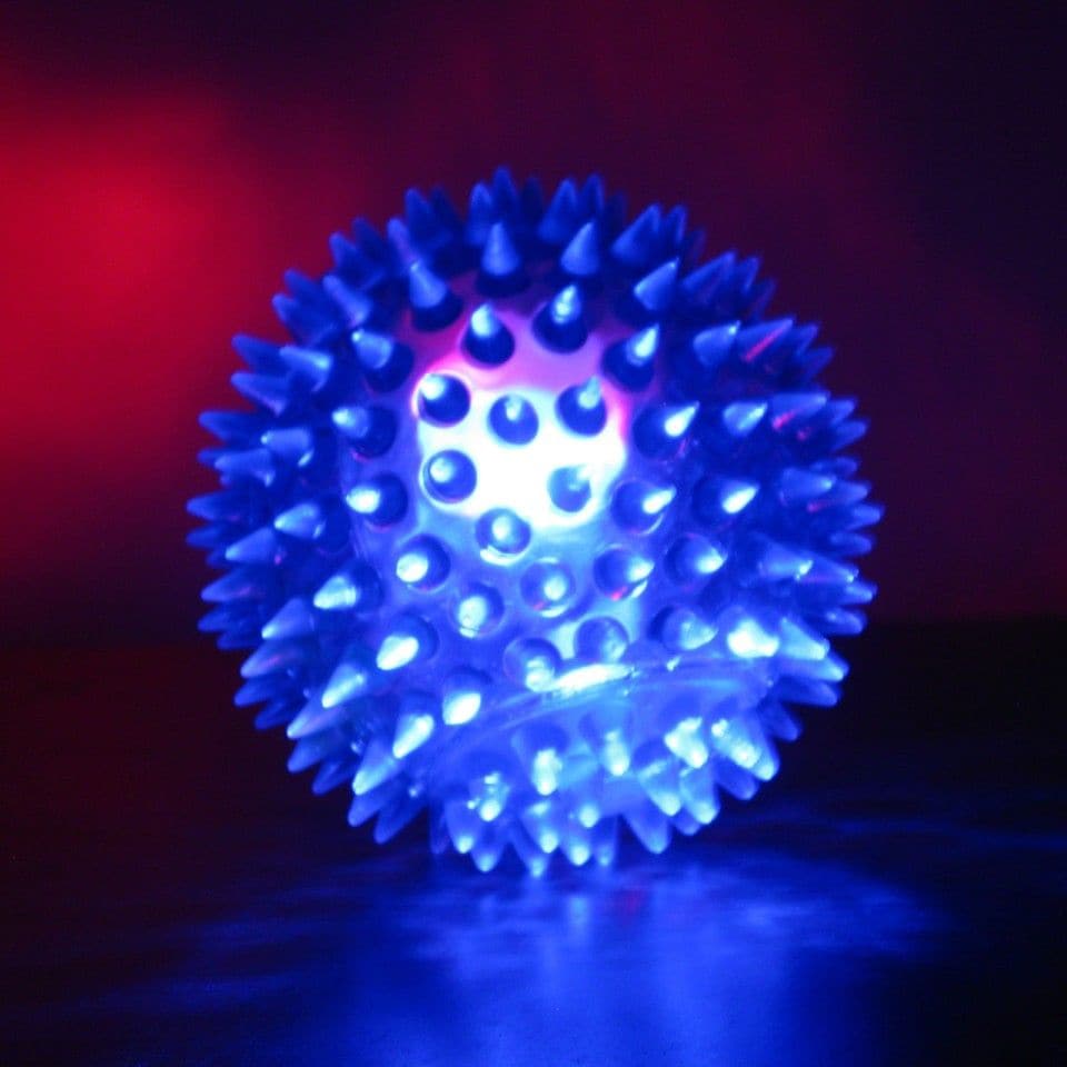 Spikey Light up ball, Experience the fusion of tactile delight and mesmerizing illumination with our Spikey Light Up Ball! Crafted for both sensory stimulation and fun, this ball is far from ordinary. Molded with soft, tactile spikes, the Spikey Light Up Ball offers a unique texture that's soothing to touch and handle. The gentle, flexible spikes not only make the ball easy to grasp, catch, or throw, but they also offer a therapeutic massage experience as the ball rolls across the hands, offering sensory re