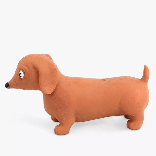 Stretchy Sausage Dog Fidget Toy, Sausage dogs are already adorable little stretchy bois. But thanks to this awesome gizmo you can really put them to the test. The stretch test, that is.Stretch makes things better. Your muscles, a limousine, and the truth... Maybe not the last one. But this Stretchy Sausage Dog Fidget Toy is specifically designed to be stretched and prodded and shaped and fiddled with until the cows come home. The Stretchy Sausage Dog Fidget Toy comes in four different colours - black, blond