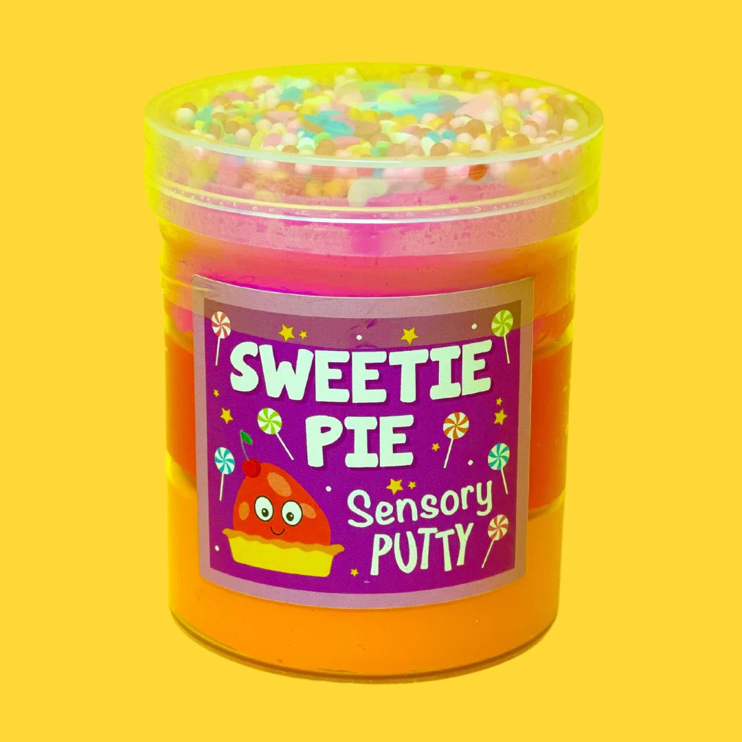 Sweetie Pie Putty, Our Sweetie Pie putty is like a theme park in a jar! Our wonderful trio of pink, red and orange putty is topped with matching coloured floam balls, rainbow heart sprinkles, a cute lollipop clay charm and accompanied with a gentle scent. Putties are air reactive and will dry out of left out. Always return to the container after play with the lid tightly on. Keep away from direct sunlight. Keep away from fabrics and porous surfaces. Container Size: 275ml Ages 5+, Adult supervision recommend