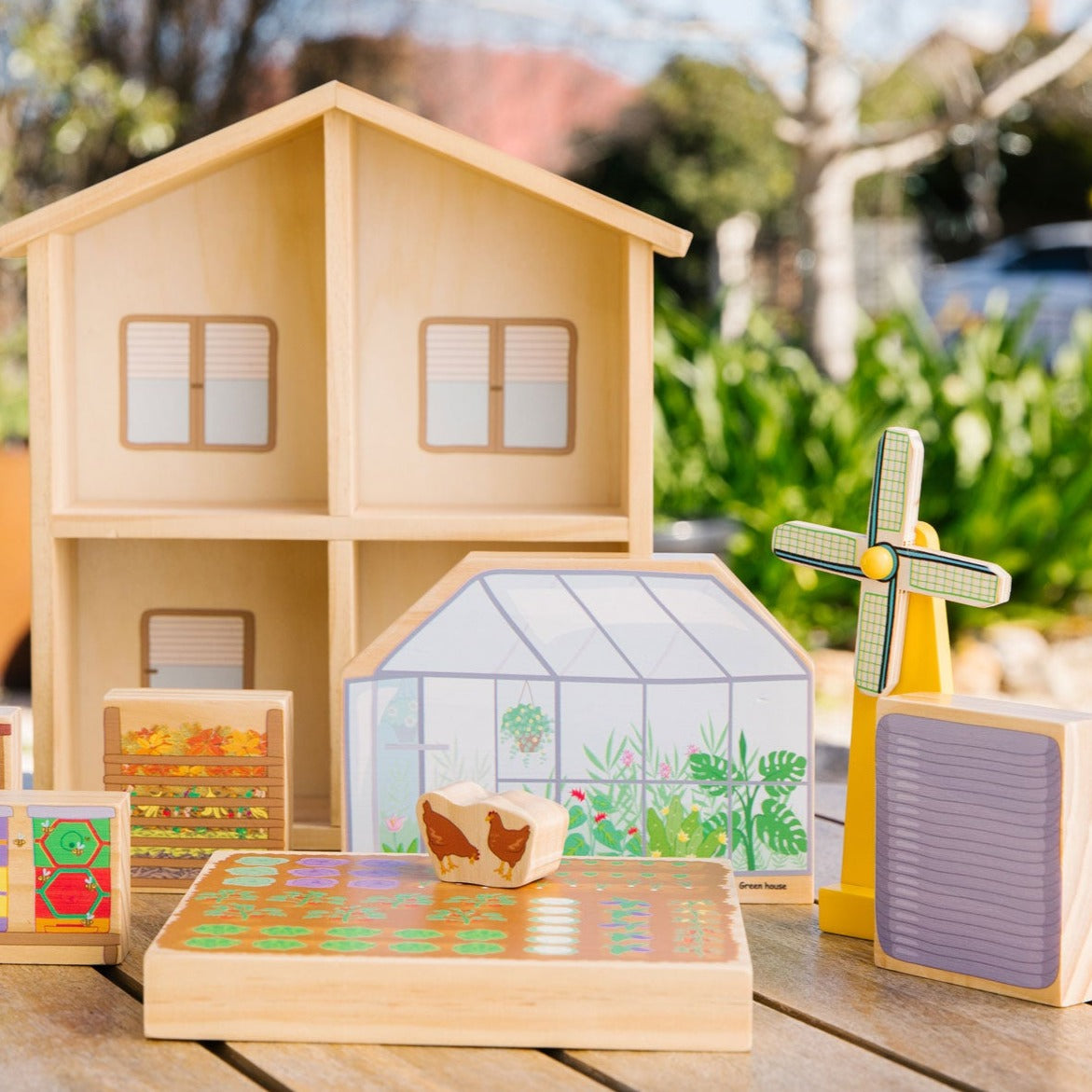 The Eco House, This sustainable living playset is perfect for children who are interested in learning about sustainable living in a fun and interactive way. With solar panels, solar hot water, a vegetable garden, chicken coop, windmill and compost bin, children can learn all about eco-friendly living. This playset encourages discussions about environmental outcomes and the importance of making good environmental decisions. Crafted from sustainably sourced New Zealand pine and plywood, this playset is both e