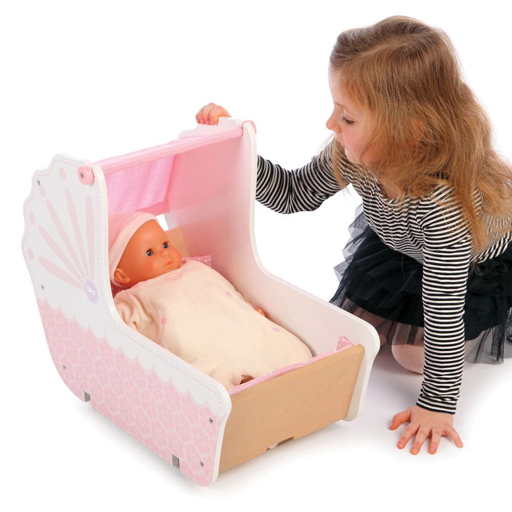 Tidlo 3-in-1 Dolls Pram, Take your doll out for a walk in style! The Tidlo 3-in-1 Dolls Pram has been beautifully constructed from wood and features a pretty pink vintage design, sturdy wheels and an easy to grip handle - but that's just the beginning!The body of the wooden dolls pram can be easily released from the frame so dolls can face forwards or backwards, and when it is time for bed, little ones can take the pram body off completely to use it as a rocking cradle on the floor!The pink fabric roof can 