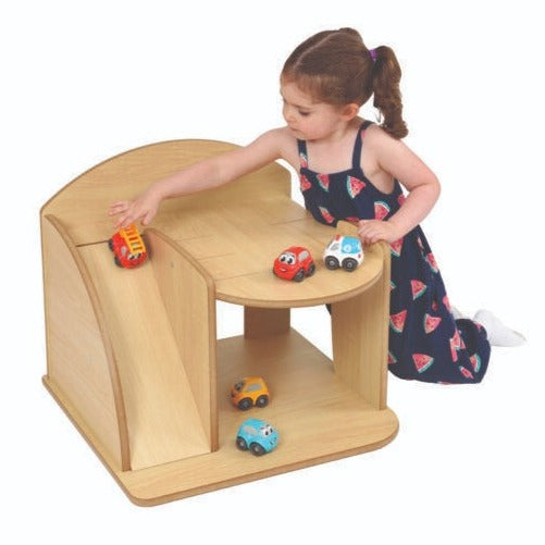 Traditional Wooden Car Garage, Introduce your little ones to hours of imaginative play with our Traditional Wooden Car Garage set. Beautifully designed and incredibly robust, this wooden garage is built to stand the test of time, as well as meet the rigorous demands of children's play. Featuring a two-level design, the garage includes a smooth ramp for cars to zoom down, as well as parking spaces on the top level. It's a simple yet captivating toy that fosters creative play, allowing children to create thei