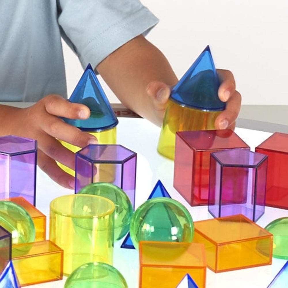 Translucent Geometric Shapes, The Translucent Geometric Shapes are a pack of 12 different shapes and 6 colours. The Translucent Geometric Shapes are ideal for learning shape names and attributes using a light panel. Translucent Geometric Shapes come in a convenient storage container perfect for storing away after use. Introduce a new dimension to your educational or playtime activities with the Translucent Geometric Shapes pack. Comprising 12 different shapes in 6 vibrant colours, this set brings learning t