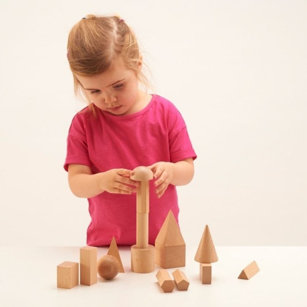 Wooden Geometric Solids - Pk15, The Wooden Geometric Solids set contain 15 smooth hardwood geometric solids,used to teach shapes recognition and to increase geometric understanding. The Wooden Geometric Solids - Pk15 includes a selection of the following geometric shapes: tetrahedron, cube, cylinder, square pyramid, cone, square prism or rectangular prism, square, circle, hemisphere, ovoid, wedge or trapezoidal prism, oblique square pyramid, oblique cone. These geometric shapes set are a great tool to ident