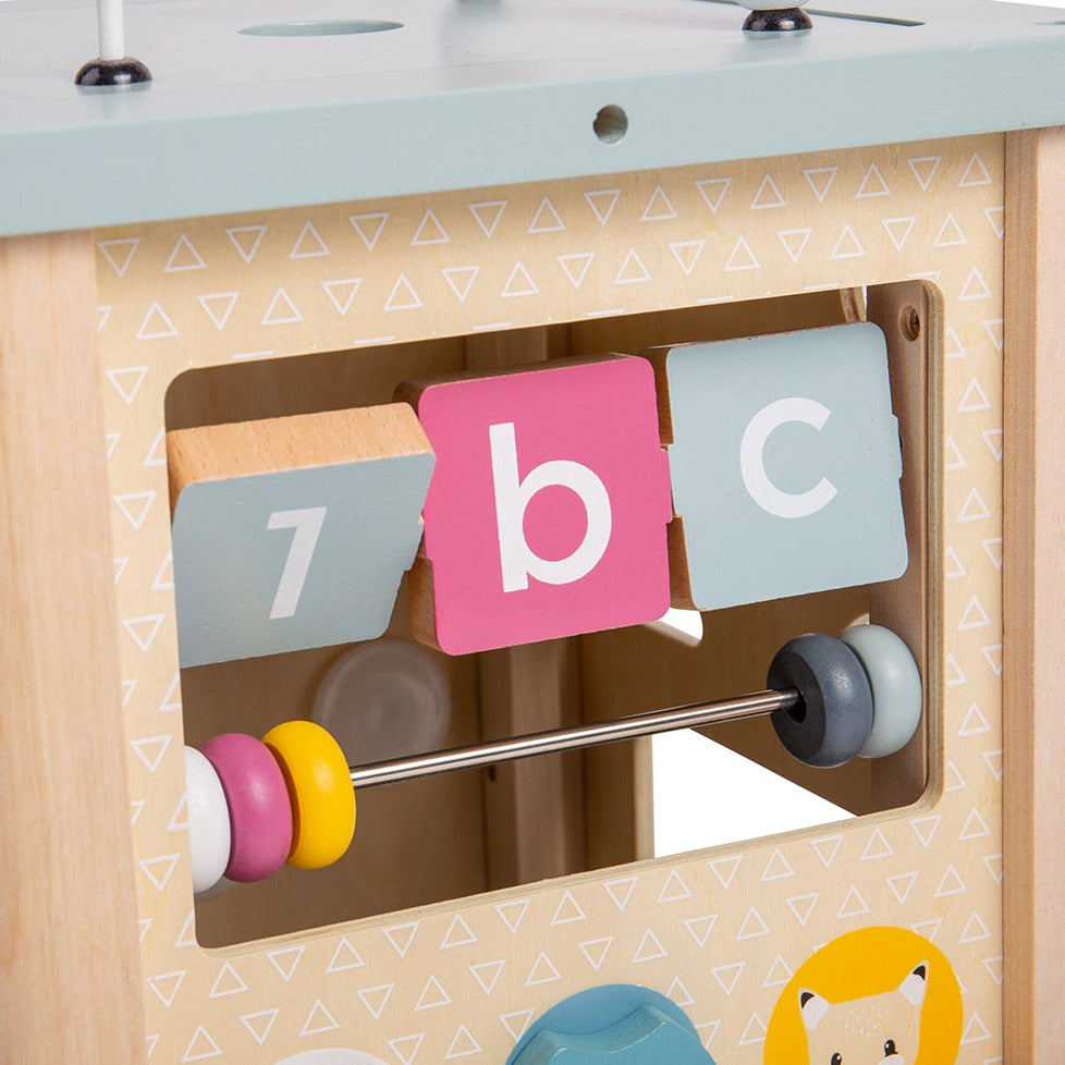 100% FSC Certified Activity Cube, Tots will be entertained for hours with our 100% FSC Wooden Activity Cube. Each of the four sides are packed full of different activities to help youngsters learn through educational play. Activities include: a shape sorter, a bead coaster, wooden cogs and much more. The soft colour palette makes this wooden baby toy suitable for both girls and boys. The wooden activity cube is perfect for developing toddlers’ social, communication and numeracy skills as they twist, spin, a