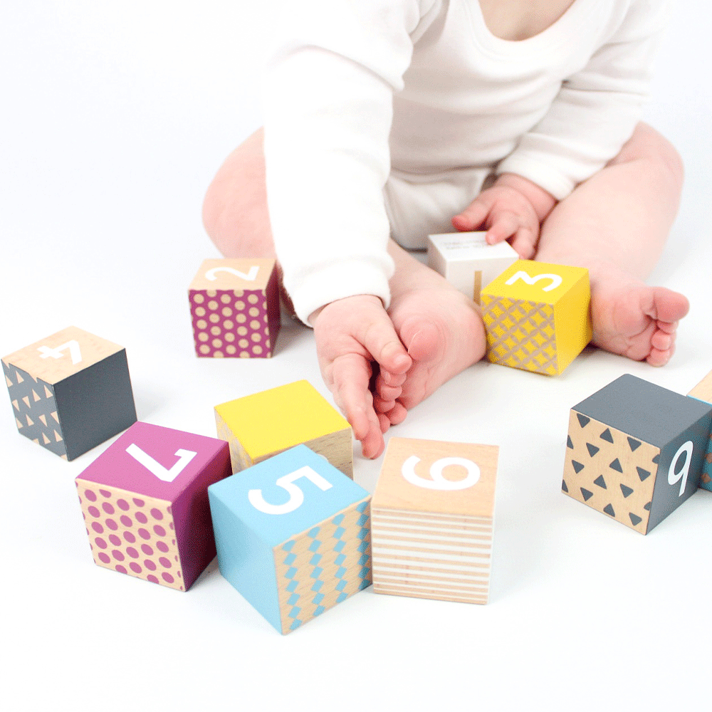 100% FSC Certified Wooden Number Blocks, Introducing our 100% FSC Certified Wooden Number Blocks, the perfect educational tool for teaching children to count. The 100% FSC Certified Wooden Number Blocks are made from sustainably sourced wood, these blocks are not only safe for little hands but also environmentally friendly.Our number blocks are designed with vibrant patterns and bold shades to make learning fun and engaging. The lightweight construction makes them easy for young children to handle and play 