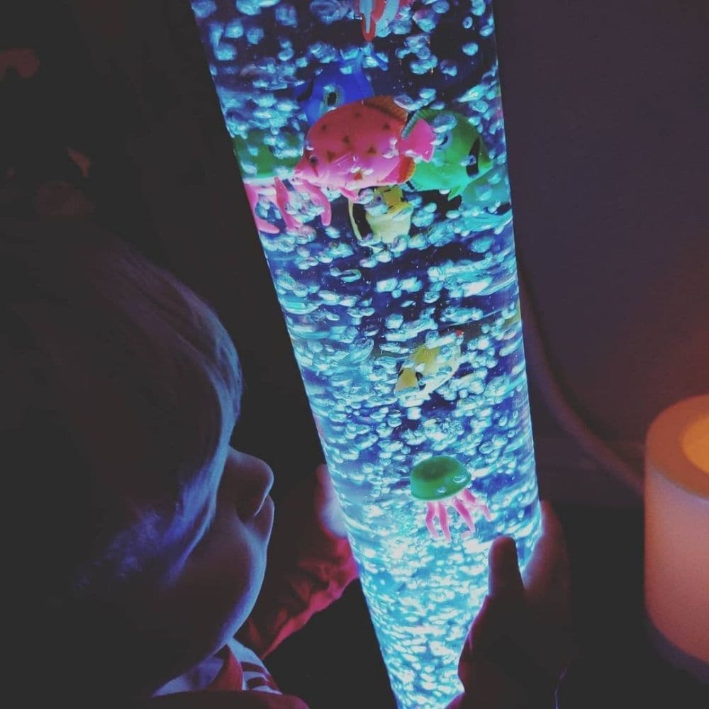 105cm Bubble Tube, A Bubble Tube is a must for any sensory room or bedroom. Watch as the Sensory Bubble tube changes colours and pretend fish bob around in the tank, as the pump hums gently. This combination stimulates the senses, great for children with autism, special needs and ADHD. The ever changing colours of the bubbles creates a calming and relaxing environment which children will love to be around The great thing about these Bubble tubes is: Colour changing through a variety of colours Calming and r