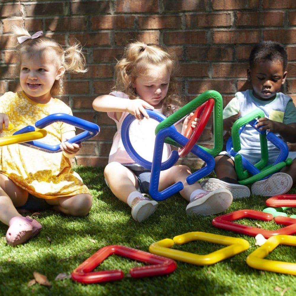 16 Piece Giant Linking Shapes, Introducing the Giant Linking Shapes set, a perfect learning tool for younger children who are just starting to explore shapes. This set includes 16 interlocking shapes in four vibrant colors, specifically designed to captivate young minds.Each set contains four square, four rectangle, four circle, and four triangle shapes, allowing children to familiarize themselves with these fundamental shapes. What sets this set apart is that each shape also features Braille, making it inc