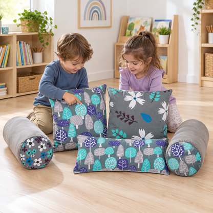 Two children comparing patterns on the Grey Printed Cushion Set