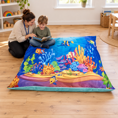 Child seated on Sea Life Wibble-Wobble Bag for shared reading