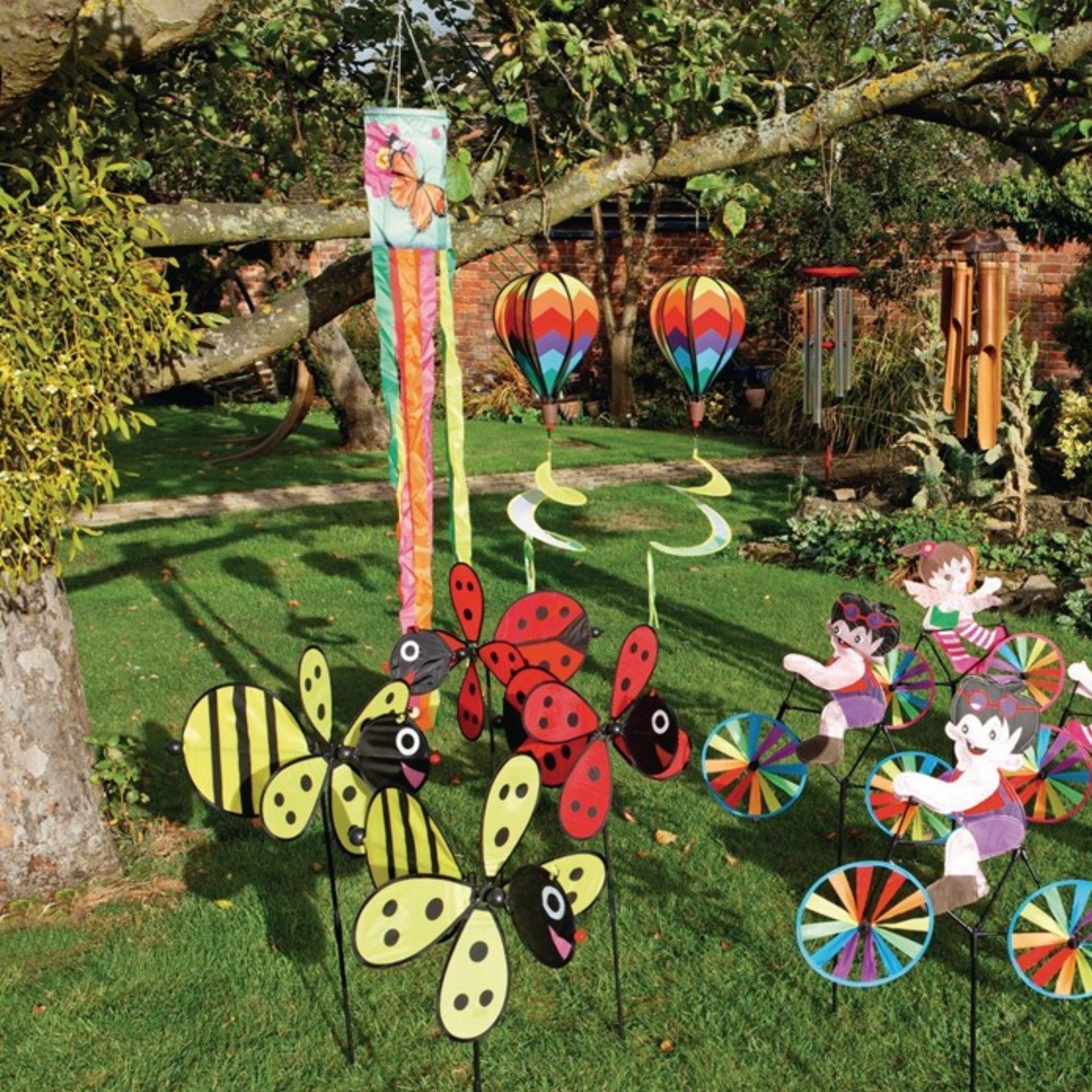 20 Piece Playground Windmill Sensory Set, Introducing the delightful Windy Playground Windmill Sensory Set, a comprehensive collection that brings a stimulating garden or playground to life.This set includes everything you need to create a sensory wonderland, featuring a range of windmills, mobiles, windsocks, and wind chimes. Each piece is carefully designed to respond to even the slightest breeze, adding a new element of movement, color, and sound to your outdoor space.The 20 Piece Windmill Sensory Set is