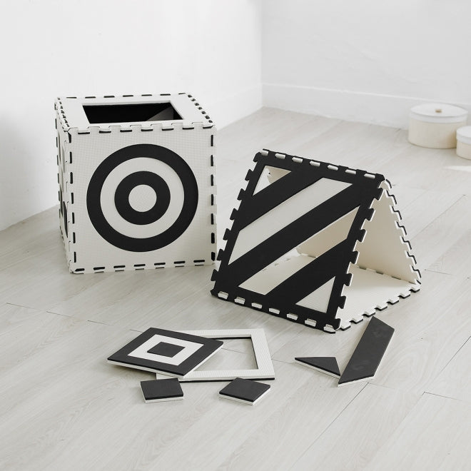 3D Creative Black And White Mats, The 3D Creative Black And White Mats are set of nine square mats each interlocking to form numerous shapes. The black and white design is printed double sided on five of the mats with various designs. The 3D Creative Black And White Mats are made from high grade EVA, each mat is soft to touch and very safe. The 3D Creative Black And White Mats provides children with visual stimulation, as they crawl and walk along the mats. Age: 6 months+. Size: 500mm square x 150mm thick S